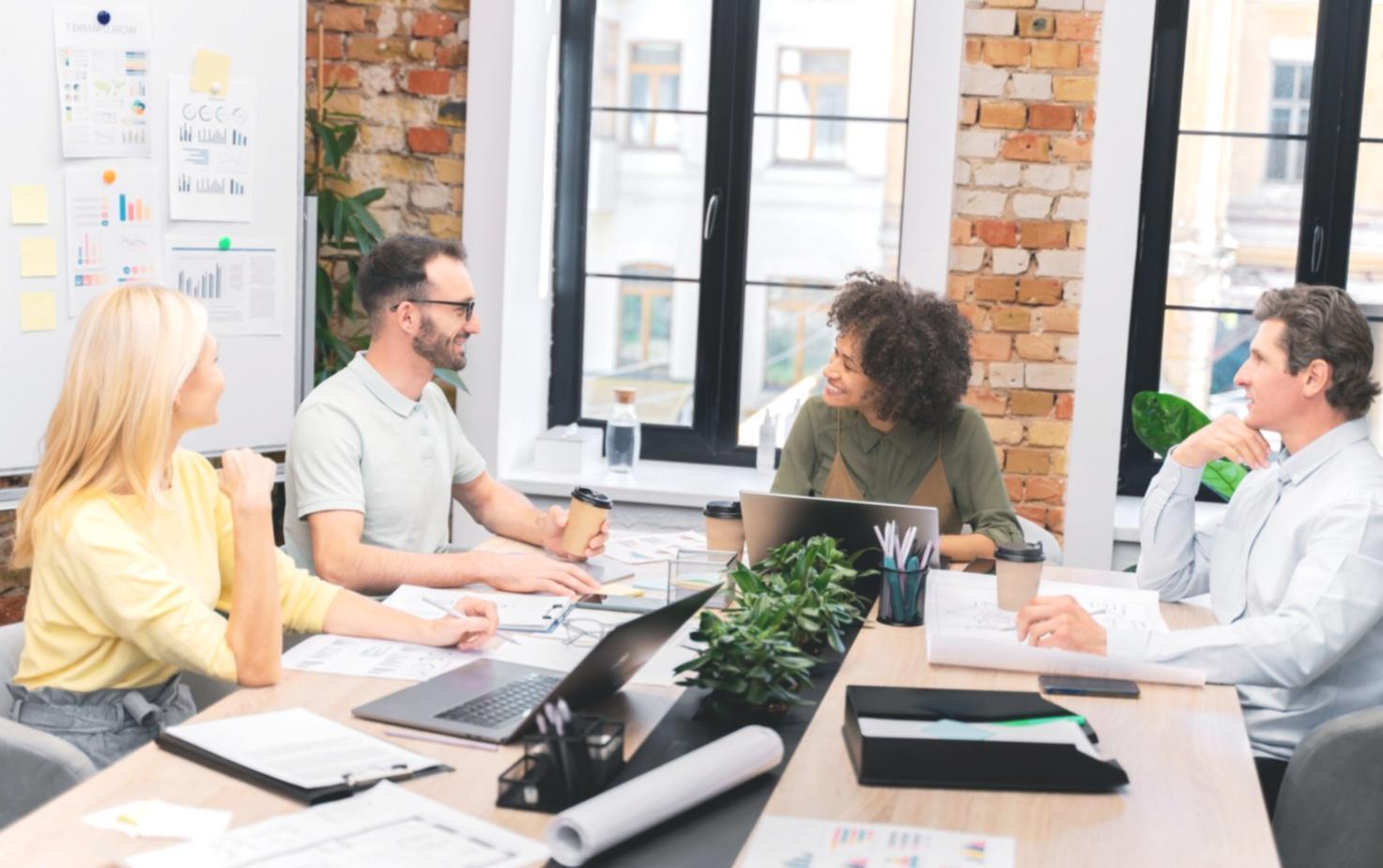 Participants engaged in team motivation workshop session